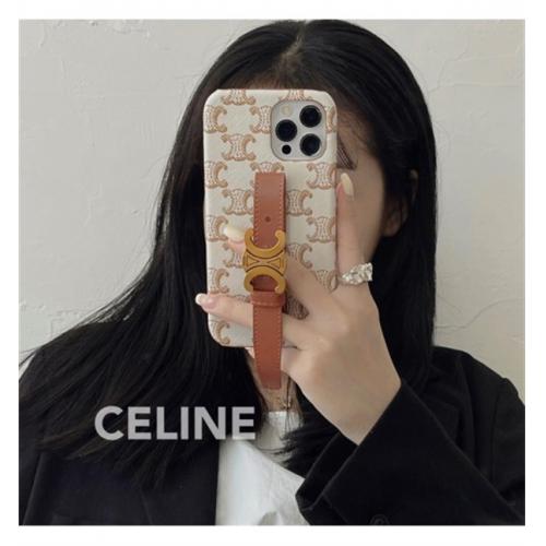 セリーヌ CELINE トリオンフモノグラム＆レザーストラップ iPhoneケース iPhone 16 PRO MAX/15/14/13 高級ファッション デザイン スタイリッシュ おしゃれ 人気ブランドスマホケース 高品質 新作 ファッション IPHONE16 PRO MAX14 PRO MAX 15 16ケース ブランド アイフォン15 16ケースファッション 全機種対応 